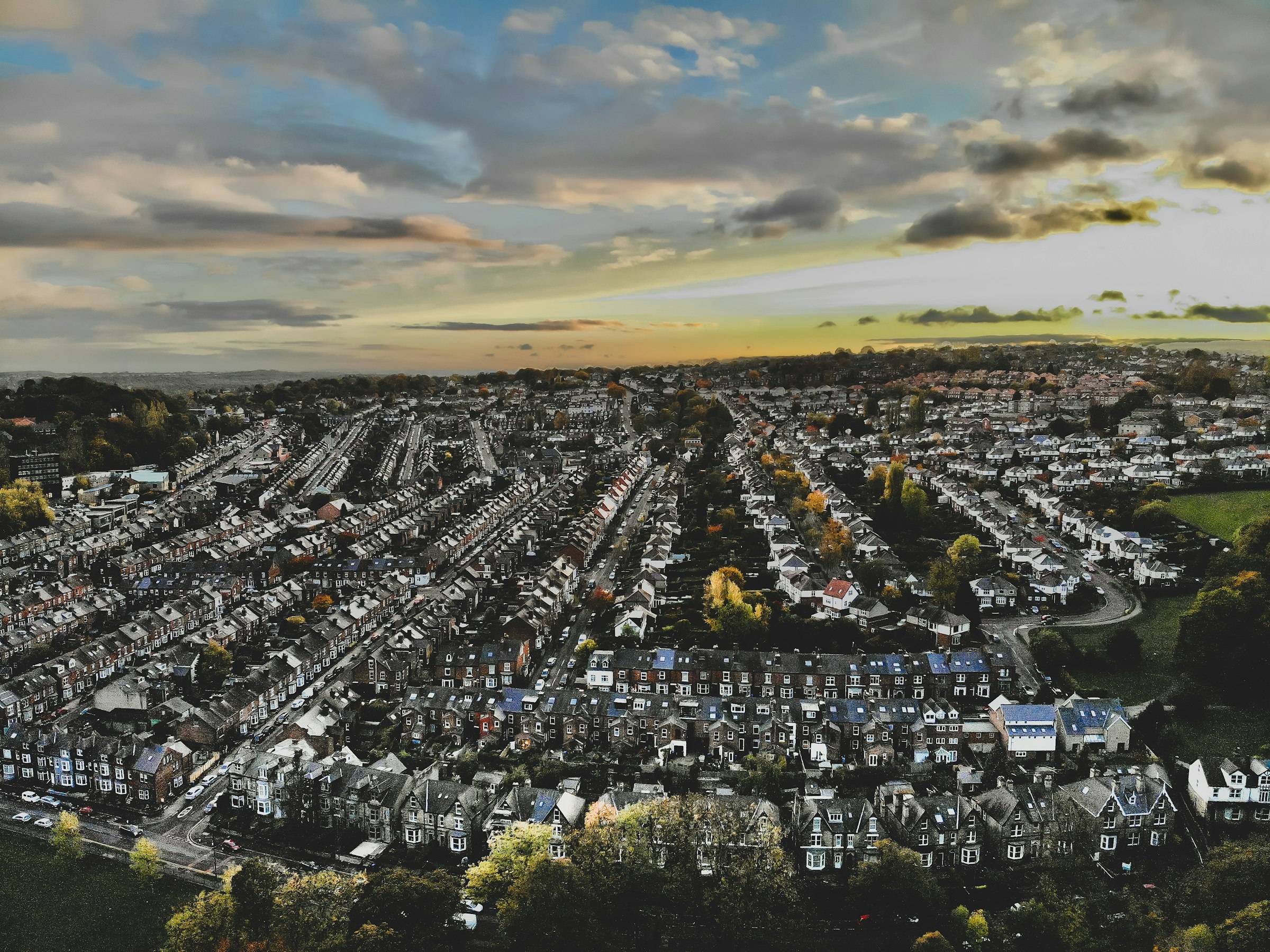 Rows of terraced streets at golden hour, from above